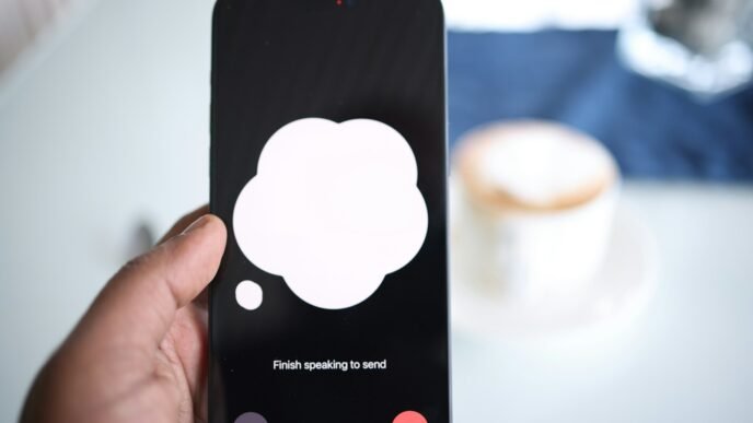 a person holding a cell phone with a speech bubble on the screen